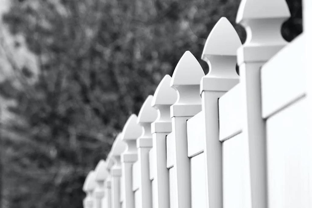 An Image of a Black and White Fence on Newtown, CT