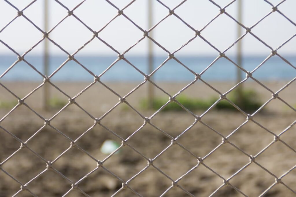Close Up Image of a Chain Link Fnence with Blurred Background